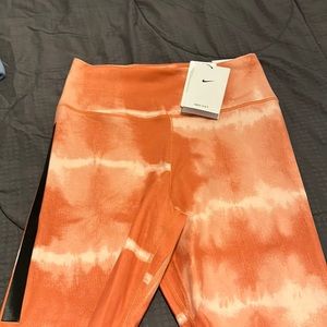 New, new worn, with tags